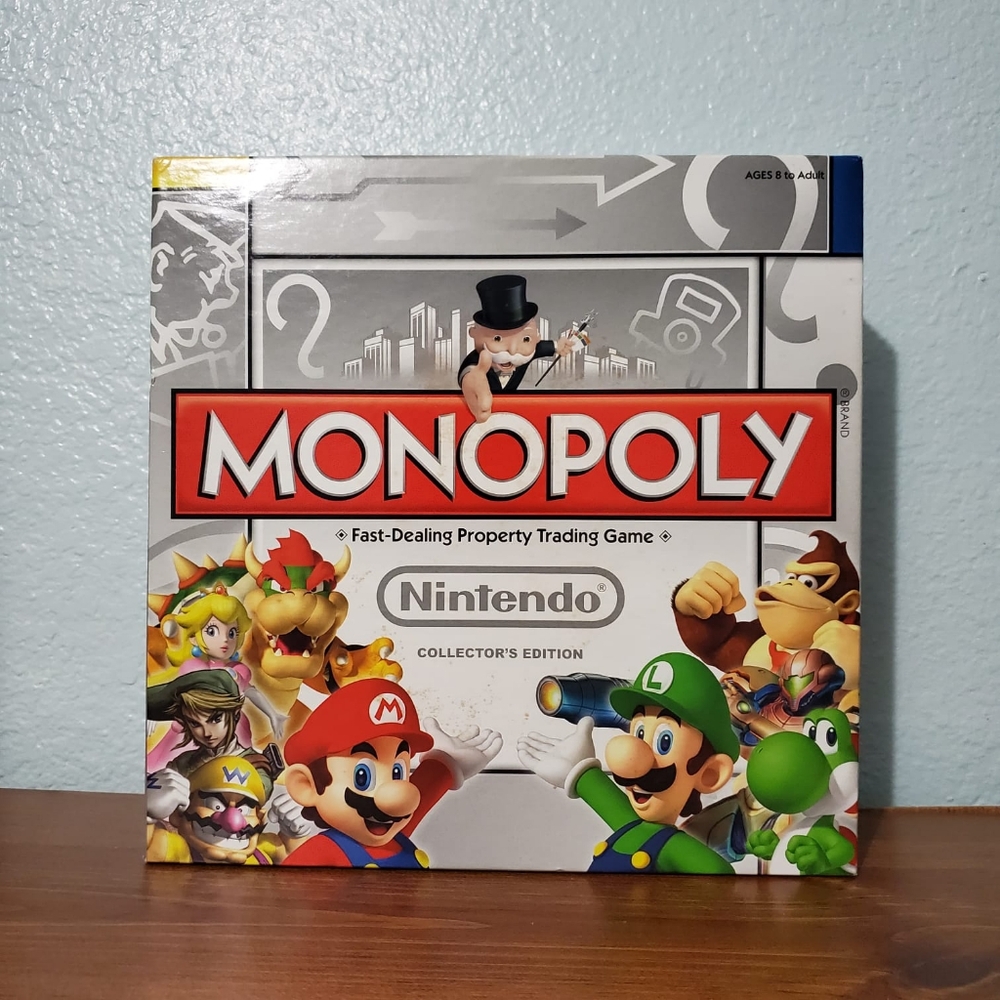 2011 Hasbro, Nintendo Super Mario Monopoly Collectors Edition. New Open Box